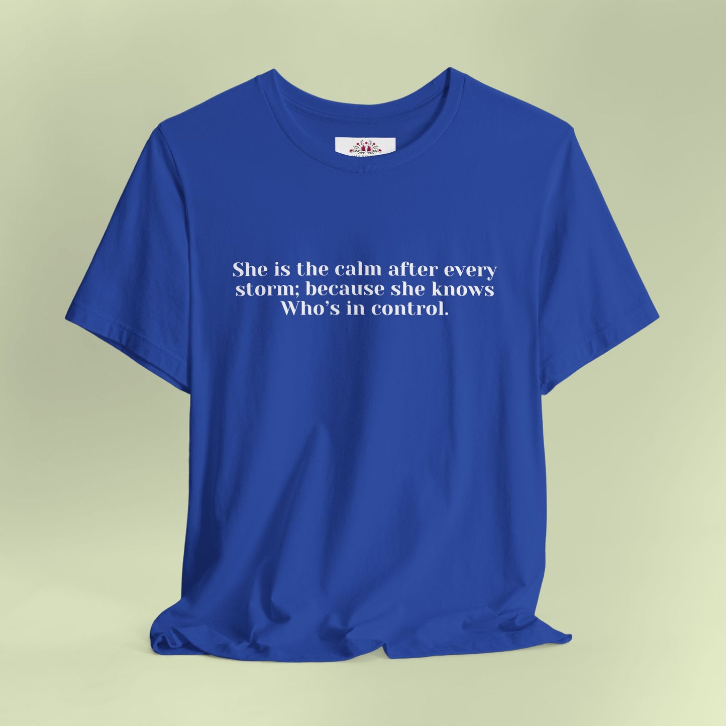 She is the calm after every storm; because she knows Who’s in control.T-Shirt for Women | Inspirational Faith Quote Tee