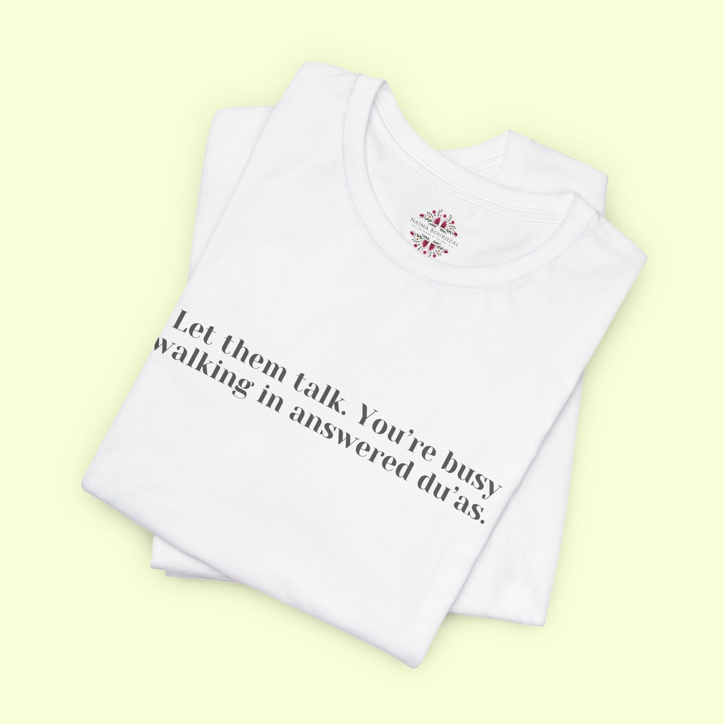 Let them talk. You’re busy walking in answered du’as. T-Shirt for Women | Inspirational Faith Quote Tee