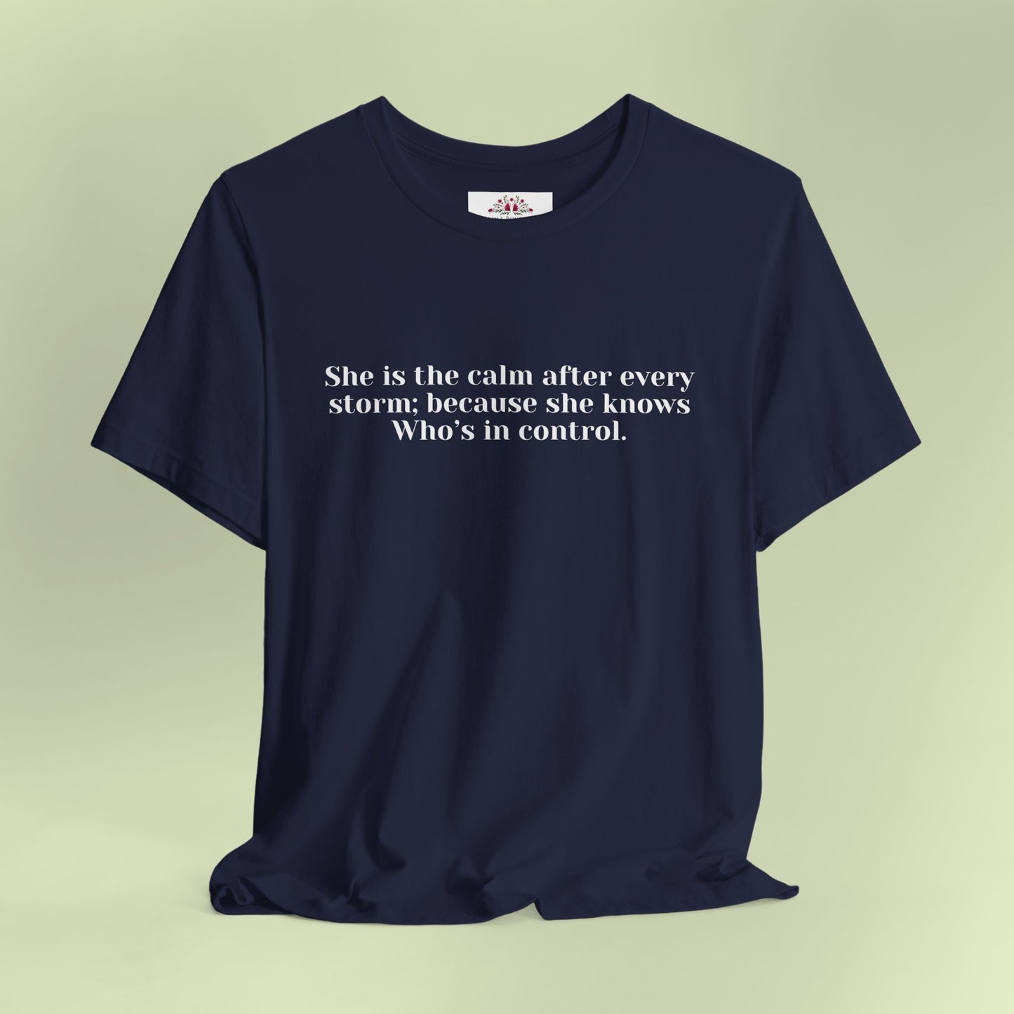 She is the calm after every storm; because she knows Who’s in control.T-Shirt for Women | Inspirational Faith Quote Tee